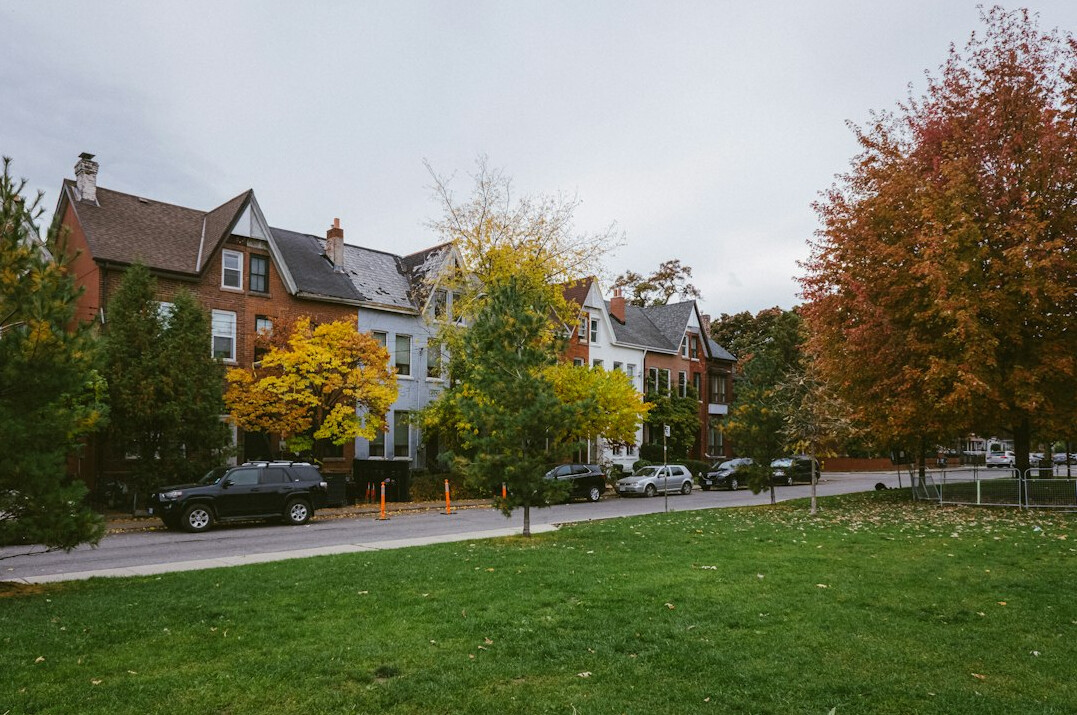Row houses on a quiet Toronto residential street in autumn